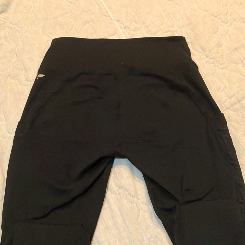Fabletics black power hold capri size medium. Like new. Mesh pockets and sides.